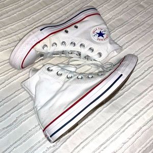 Nearly new white high top converse